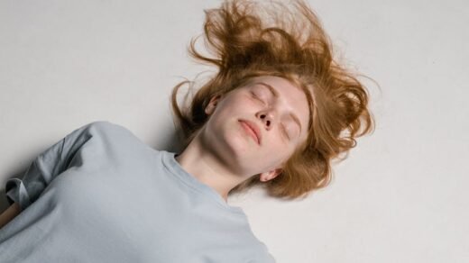a fearful woman lying down while overcoming her fear of cockroaches